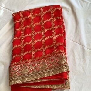 Vibrant Red and Gold Women's Saree